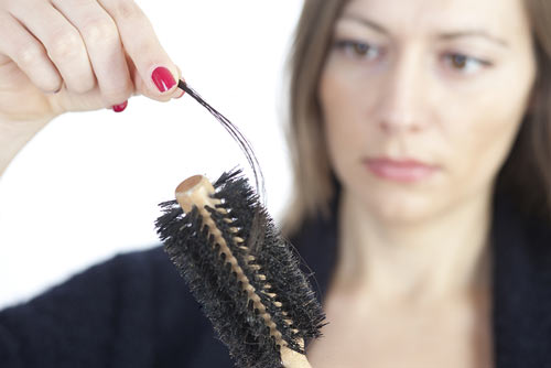 women losing hair